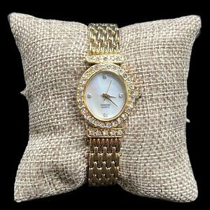 Woman’s Watch Gold Tone Metal Diamond Quartz Oval Face Woven Band-Needs Battery